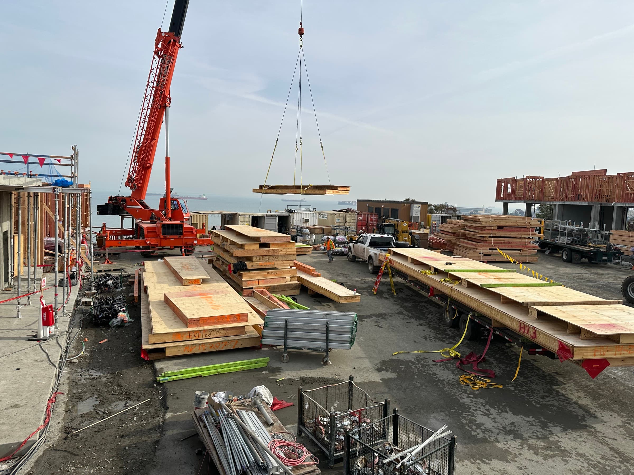 Hunters View crane lifting cassette with San Francisco Bay